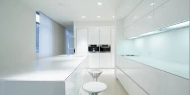 Modern kitchen with white cabinetry and sleek design