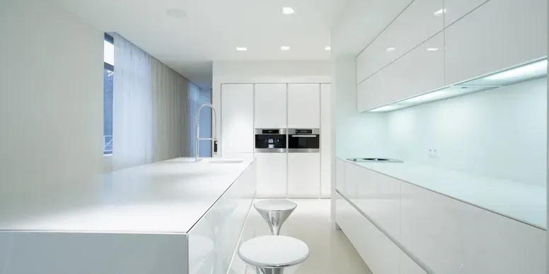 Modern kitchen with white cabinetry and sleek design